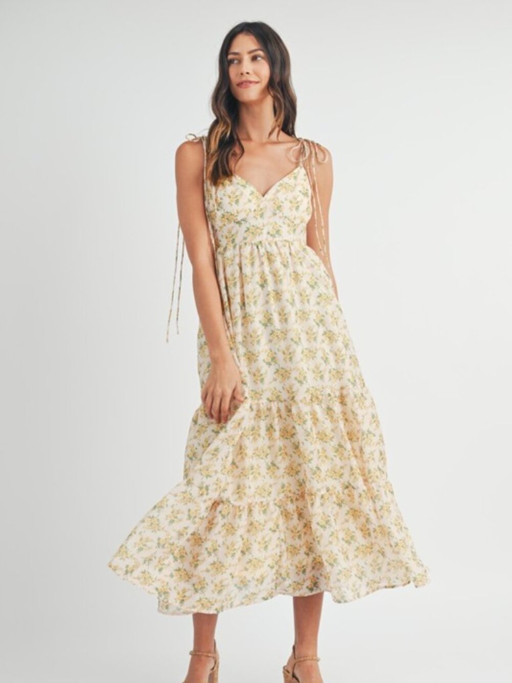 Floral print double self tie spaghetti strap tiered midi dress.
